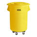 A yellow plastic trash can with wheels and a lid.