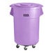 A Lavex purple plastic trash can with wheels and a lid.