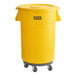 A yellow plastic Lavex trash can with wheels and a lid.