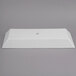 A white rectangular G.E.T. Enterprises Bugambilia metal platter with a textured finish and a round hole in the center.