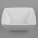 A white square G.E.T. Enterprises Bugambilia bowl on a gray background.