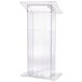 A clear acrylic podium with a shelf.