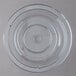 A clear polycarbonate plate cover over a white background.