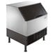 A large white Manitowoc undercounter ice machine with a black lid.