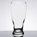 A Libbey pub glass on a table with a white background.