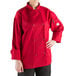a person wearing a red chef coat