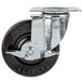 A black metal Cooking Performance Group plate caster with a silver metal wheel.