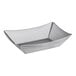 A silver rectangular stainless steel serving basket with a curved edge.