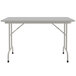 A gray rectangular Correll folding table with a gray metal frame.