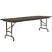 A rectangular walnut folding table with a brown metal frame.
