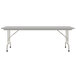 A white rectangular Correll folding table with a gray frame.