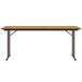 A Correll rectangular seminar table with off-set legs.