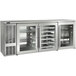A Perlick stainless steel back bar refrigerator with glass doors.
