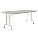 A gray rectangular Correll folding table with a gray frame.