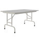 A Correll rectangular folding table with a gray granite top and gray legs.