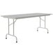 A rectangular gray granite folding table with a gray frame and legs.