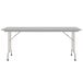 A white rectangular Correll folding table with a gray frame.