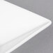 A close up of a CAC Sushia Super White square porcelain bowl.