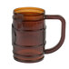 A translucent brown plastic barrel mug with a handle.