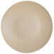 A close-up of a Tuxton TuxTrendz matte beige china plate.