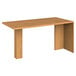 A HON Harvest wood peninsula desk with legs.