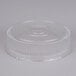 A clear plastic lid with a circular design on a white background.