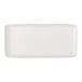 A white rectangular Tuxton China tray with an embossed design.