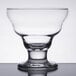 a clear glass with a rim