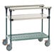 A Metro stainless steel cart with two SuperErecta Pro shelves on wheels.