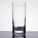 A Stolzle New York clear tumbler on a table.