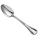 A Oneida Titian stainless steel serving spoon with a silver handle and spoon.
