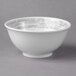 A white bowl with a grey rim.