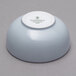 A light blue Schonwald porcelain dip dish with a white rim.