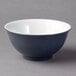 A Schonwald blue and white porcelain bowl with a white rim.