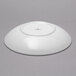 A white Schonwald round porcelain deep coupe plate with a round rim.