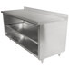 A stainless steel Advance Tabco work table with a fixed midshelf.