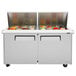 A Turbo Air stainless steel refrigerated sandwich prep table with two drawers.