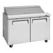 A stainless steel Turbo Air refrigerated sandwich prep table with two doors.