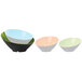 A stack of GET Brasilia melamine bowls with green and black rims. The bowls are green, black, and white.