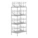 A Regency chrome wire shelf kit with wire shelves and can racks on it.