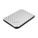 A close up of a silver Verbatim Store 'n Go portable hard drive with a patterned design.