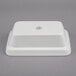 A white resin-coated rectangular china bowl with a textured finish.