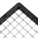 a black plastic grid with holes