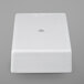 A white rectangular bowl with a textured finish.