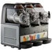 A Vollrath Triple 1.6 Gallon Frozen Beverage Machine with three tubes.