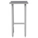 An Advance Tabco stainless steel filler table with legs.