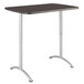 A rectangular black and white table with silver legs.
