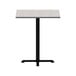 A white square Alera laminate table top with a black border.