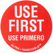 A roll of red National Checking Company Use First labels with white text.