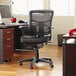 A black Alera Elusion office chair with a black mesh back.